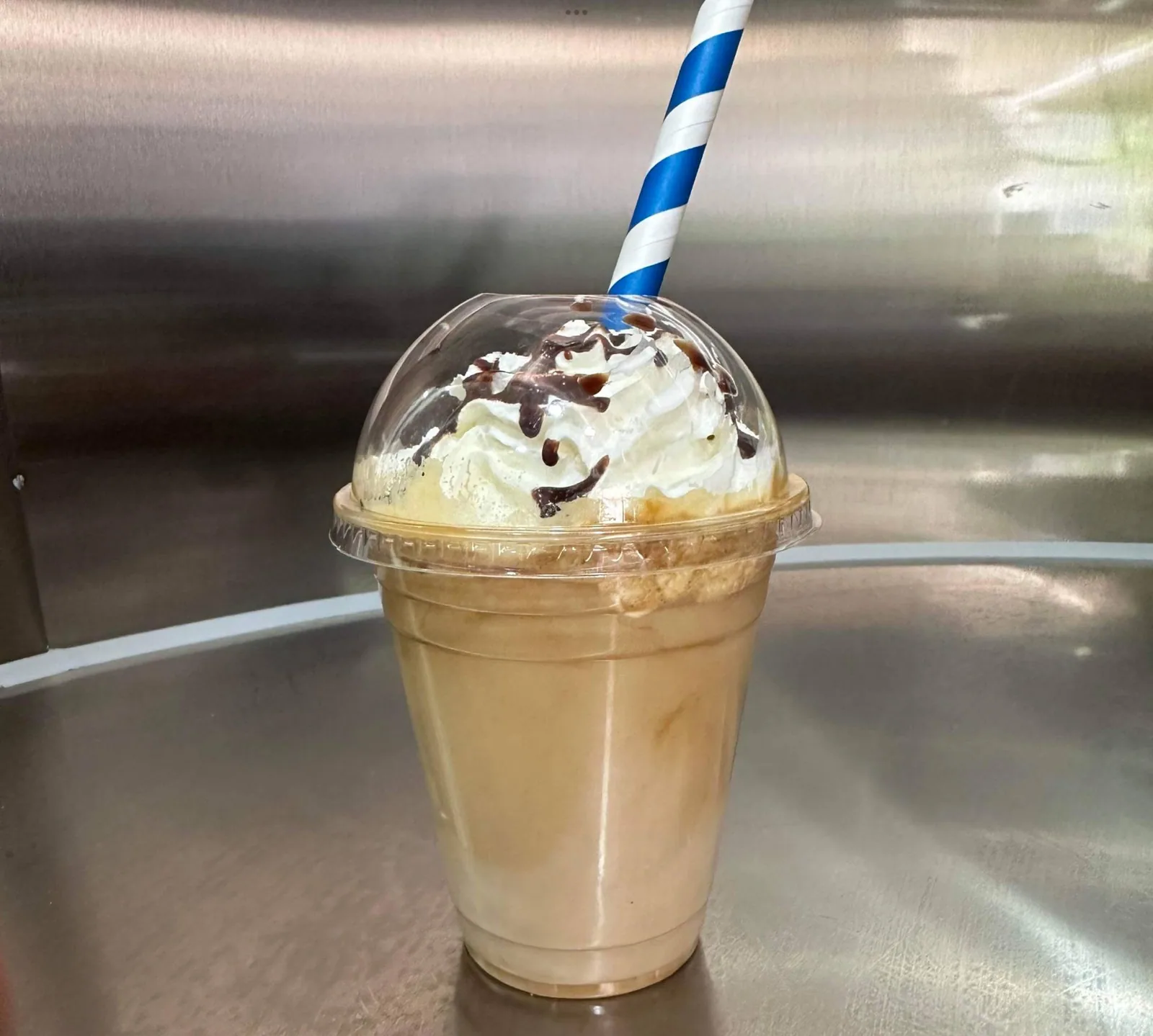 Iced coffee topped with cream