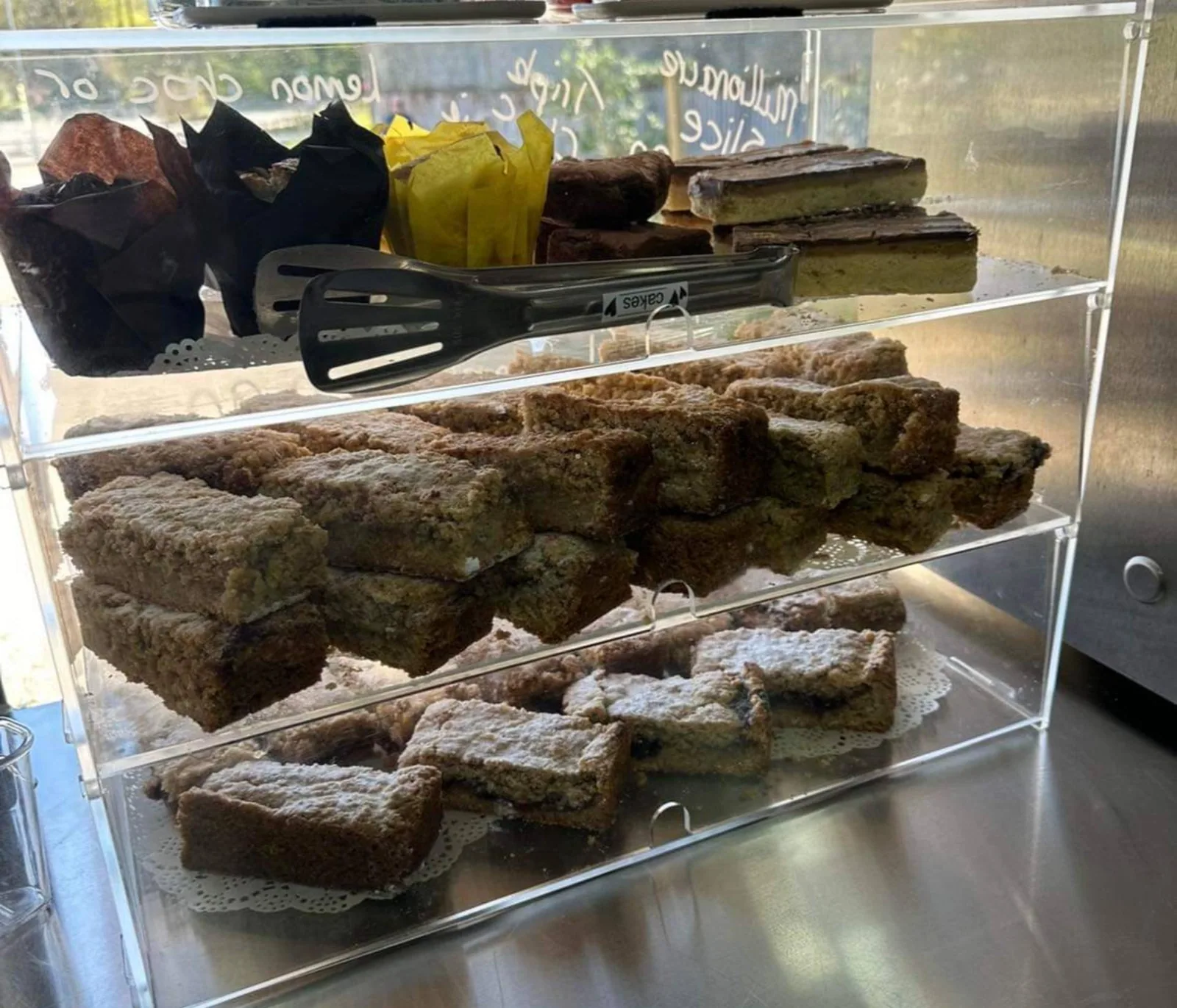 Slices of baked cake in the display