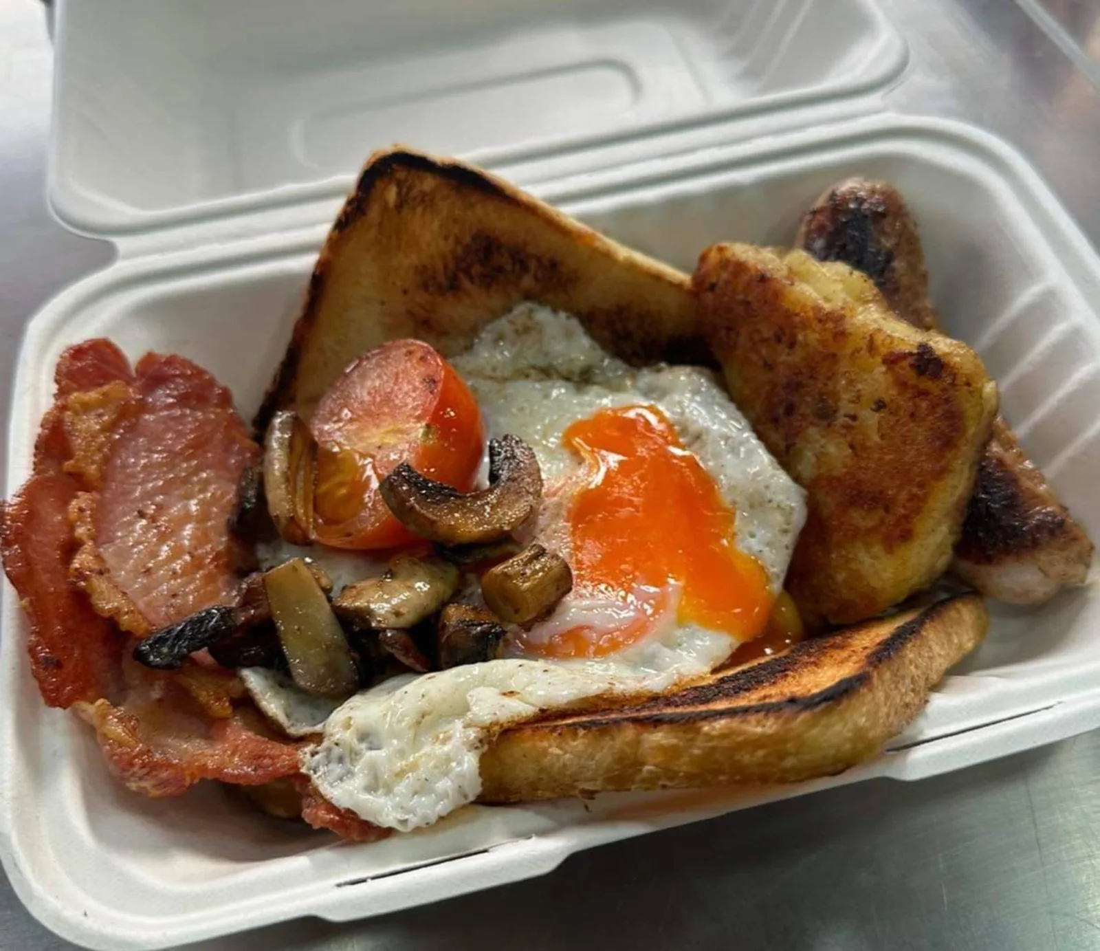 Breakfast served in a takeaway box